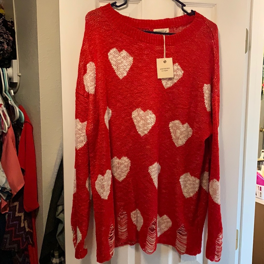 Heart sweater with distressing